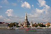 Bangkok Wat Arun - Temple  lit by the rising sun at down.